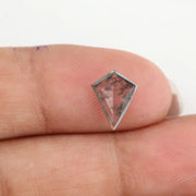 Kite-cut lab grown diamond with natural-style internal inclusions, geometric faceting, and transparent crystal body, photographed on a white background for ethical fine jewelry and custom engagement ring design.