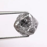 natural rough diamond showing diamond cleavage and raw diamond appearance grey rough diamond 