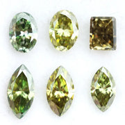 Rare fancy color lab grown diamonds in green and yellow mix shapes oval marquise and emerald cut loose stones