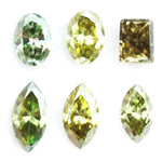 Rare fancy color lab grown diamonds in green and yellow mix shapes oval marquise and emerald cut loose stones