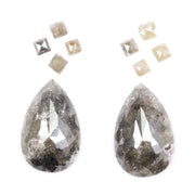 Large pear shaped salt and pepper natural diamond with dramatic black and grey inclusions paired with kite shaped accent diamonds, rustic galaxy diamond set ideal for alternative engagement ring or custom fine jewelry design.