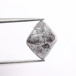 natural rough diamond showing diamond cleavage and raw diamond appearance grey rough diamond 