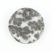 High-quality lab-grown diamond featuring a stunning black and white patterned design, symbolizing eco-friendly elegance and sustainable luxury.