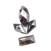 Set of natural salt and pepper diamonds with dark galaxy inclusions in mixed faceted shapes including marquise, kite and baguette cut stones for unique custom jewelry or engagement ring designs.