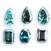 Fancy blue lab grown diamonds mix shapes including pear, oval and emerald cut loose CVD diamonds for engagement rings, custom jewelry making and fine jewelry designs with brilliant sparkle and modern sustainable luxury.