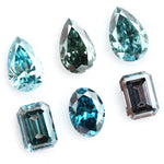 Fancy blue lab grown diamonds mix shapes including pear, oval and emerald cut loose CVD diamonds for engagement rings, custom jewelry making and fine jewelry designs with brilliant sparkle and modern sustainable luxury.