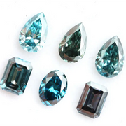 Fancy blue lab grown diamonds mix shapes including pear, oval and emerald cut loose CVD diamonds for engagement rings, custom jewelry making and fine jewelry designs with brilliant sparkle and modern sustainable luxury.