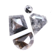 Natural salt and pepper diamond with black and white galaxy inclusions, rustic natural diamond gemstones in unique geometric cuts for engagement rings and custom artisan jewelry.
