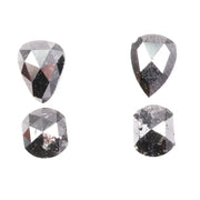 Natural salt and pepper rose cut diamond set featuring pear, kite, and cushion shapes with gray inclusions, rustic natural diamond gemstones for custom engagement rings and fine jewelry making.