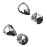 Natural salt and pepper rose cut diamond set featuring pear, kite, and cushion shapes with gray inclusions, rustic natural diamond gemstones for custom engagement rings and fine jewelry making.