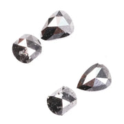 Natural salt and pepper rose cut diamond set featuring pear, kite, and cushion shapes with gray inclusions, rustic natural diamond gemstones for custom engagement rings and fine jewelry making.