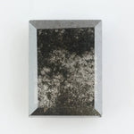 Baguette cut salt and pepper lab grown diamond with natural black inclusions, unique speckled pattern, transparent edges, ethically grown conflict free gemstone for modern jewelry