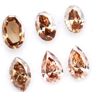 Rare mix shape lab grown diamond lot featuring fancy brown lab grown diamonds, ethical loose diamonds for fine jewelry making, engagement rings, pendants, earrings and custom luxury jewelry designs.