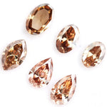 Rare mix shape lab grown diamond lot featuring fancy brown lab grown diamonds, ethical loose diamonds for fine jewelry making, engagement rings, pendants, earrings and custom luxury jewelry designs.