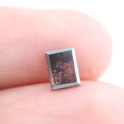 Baguette cut salt and pepper lab grown diamond with natural black inclusions, unique speckled pattern, transparent edges, ethically grown conflict free gemstone for modern jewelry