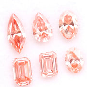 Loose fancy pink lab grown diamonds in marquise, pear, oval and emerald step cuts, perfect lab created diamonds for fine jewelry making, engagement rings and custom jewelry designs.