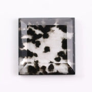2.59 Ct black and white square cut lab grown diamond loose stone with contrasting tones and geometric shape.
