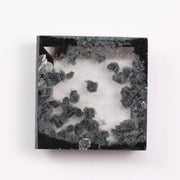 2.59 Ct black and white square cut lab grown diamond loose stone with contrasting tones and geometric shape.