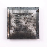 2.43 Ct black square cut lab grown diamond loose stone with sharp geometric shape, deep black color, and brilliant modern faceting for custom jewelry.