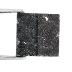 Close-up of a princess cut lab-grown diamond with square shape, sharp facets, and visible inclusions, showcasing modern geometric brilliance and ethical gemstone craftsmanship for jewelry making