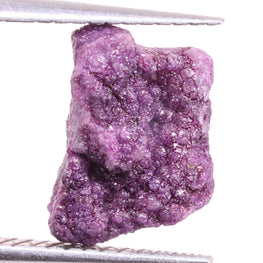 Purple diamond on a white background