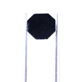 Black octagonal sign on a white background
