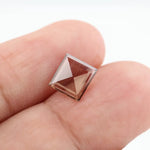 Square pyramid cut lab grown diamond with soft champagne tone, high clarity, polished facets, and modern geometric shape on a clean white background