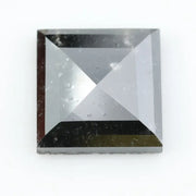 Square step-cut lab grown diamond with crisp geometric facets, high clarity, and modern symmetrical design on a clean white background