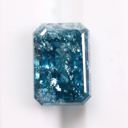 1.36 Ct blue emerald cut lab grown diamond loose stone with rich vivid color and clean step-cut rectangular facets for custom engagement ring or fine jewelry design.