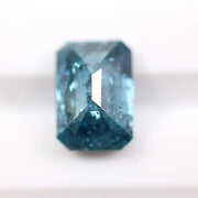 1.36 Ct blue emerald cut lab grown diamond loose stone with rich vivid color and clean step-cut rectangular facets for custom engagement ring or fine jewelry design.