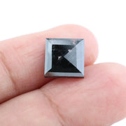 Square step-cut lab grown diamond with crisp geometric facets, high clarity, and modern symmetrical design on a clean white background