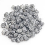 dark grey natural diamond with a rugged rough surface for wholesale diamond buyers
