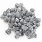 dark grey natural diamond with a rugged rough surface for wholesale diamond buyers