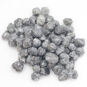 dark grey natural diamond with a rugged rough surface for wholesale diamond buyers