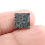 Square step-cut lab grown diamond with crisp geometric facets, high clarity, and modern symmetrical design on a clean white background