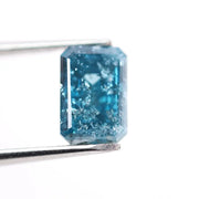 1.36 Ct blue emerald cut lab grown diamond loose stone with rich vivid color and clean step-cut rectangular facets for custom engagement ring or fine jewelry design.