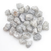 grey white diamond with a natural uneven surface for handmade jewelry creations