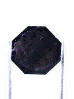 Black octagonal diamond on a white background