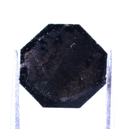 Black octagonal diamond on a white background