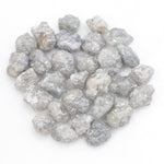 grey white diamond with a natural uneven surface for handmade jewelry creations