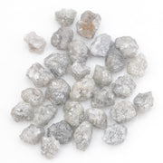 grey white diamond with a natural uneven surface for handmade jewelry creations