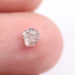 Pink diamond earrings in fine jewelry setting