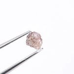 Pink diamond earrings in fine jewelry setting