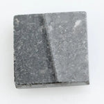 Square step-cut lab grown diamond with crisp geometric facets, high clarity, and modern symmetrical design on a clean white background