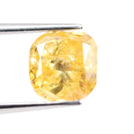 1.74 Ct yellow cushion cut lab created diamond loose stone with vibrant golden color and softly rounded square shape for custom engagement ring or luxury jewelry setting.