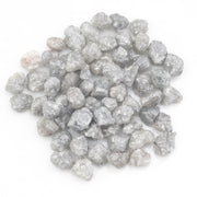 light grey natural diamond with a rough unpolished surface for custom jewelry creation