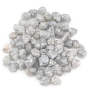 light grey natural diamond with a rough unpolished surface for custom jewelry creation