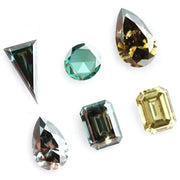 Fancy color lab grown diamond mixed shape CVD loose diamonds including emerald, pear, round and triangle cut for fine jewelry making.