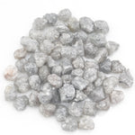 light grey natural diamond with a rough unpolished surface for custom jewelry creation