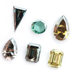 Fancy color lab grown diamond mixed shape CVD loose diamonds including emerald, pear, round and triangle cut for fine jewelry making.